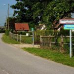 Panneau indiquant Graveron Semerville et Village Etoil sur route